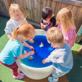 Children enjoying water play outdoors